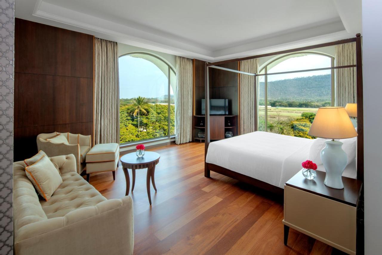 Radisson Blu Plaza Hotel Mysore Exteriör bild A suite at the hotel
